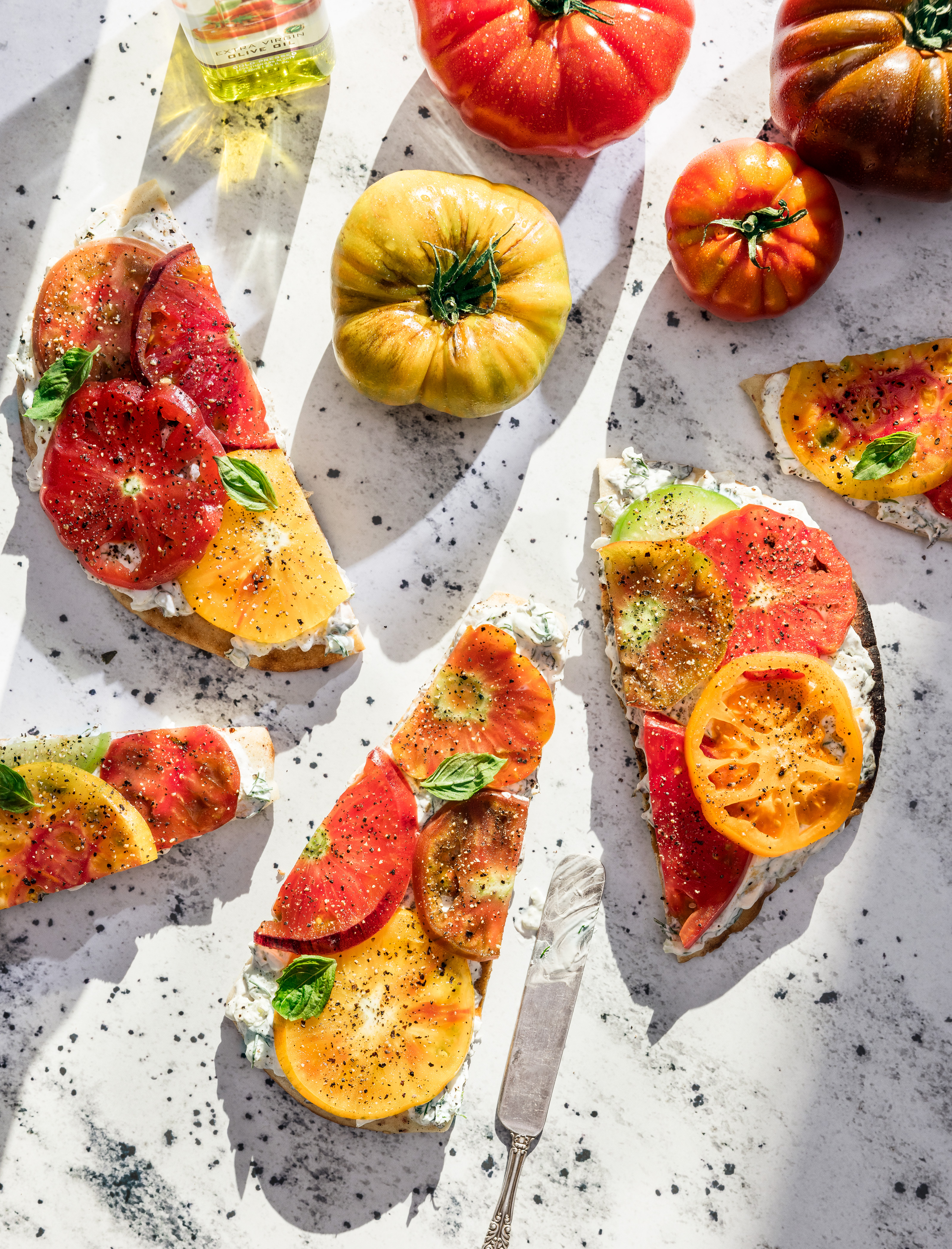 fresh heirloom tomatoes with tzatziki on pita by alyssa wernick food stylist styling dallas tx